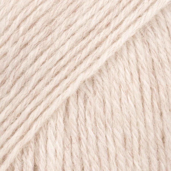 DROPS Fabel Uni Colour 124 Sable blanc